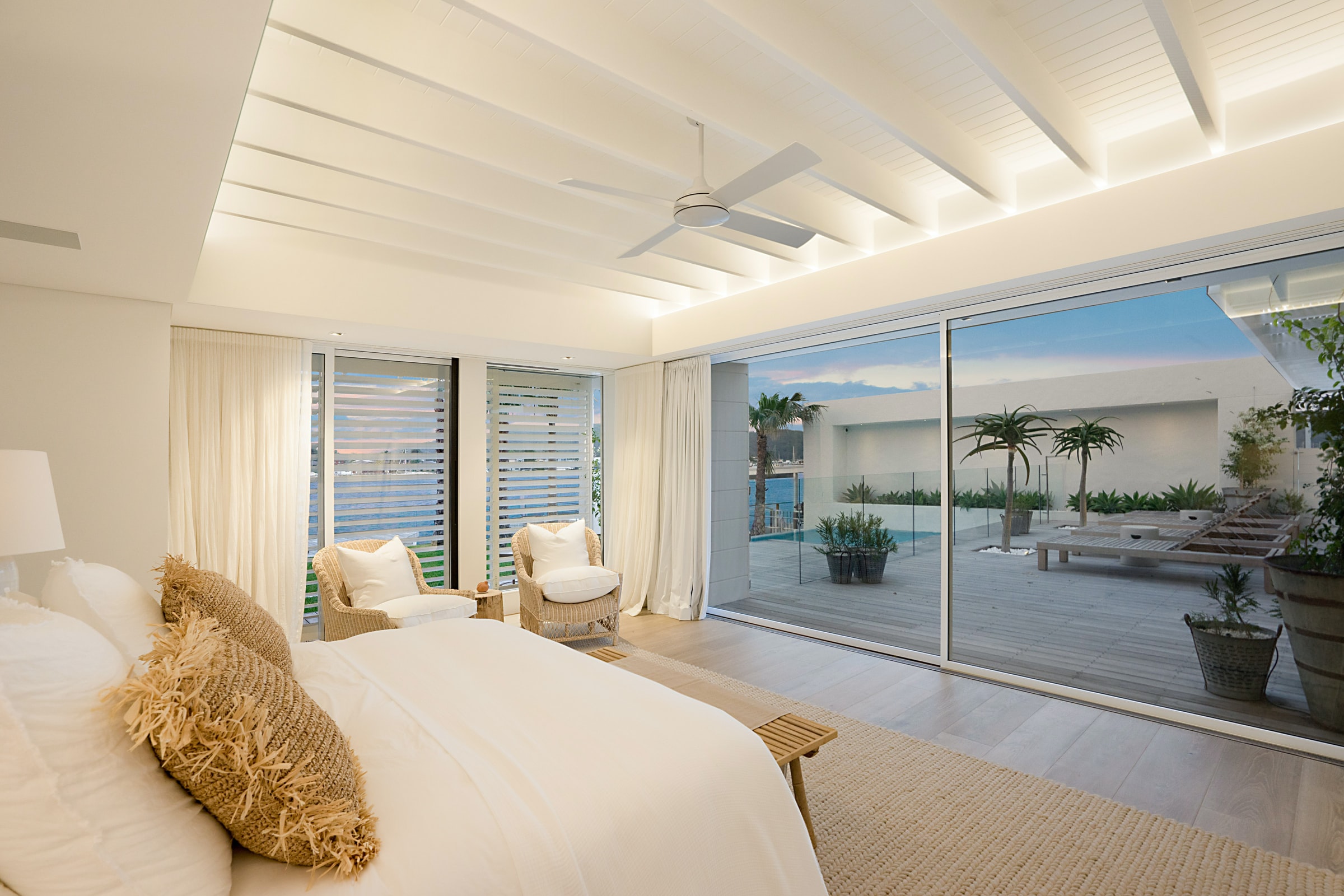 bedroom with view to the pool